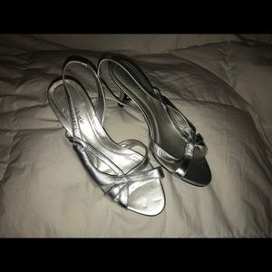 Silver strappy sandals worn once!